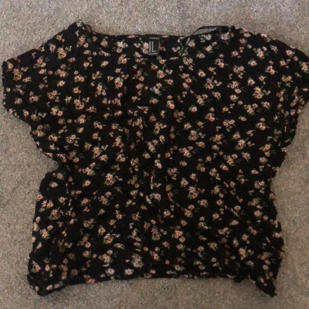 sunflower patterned blouse